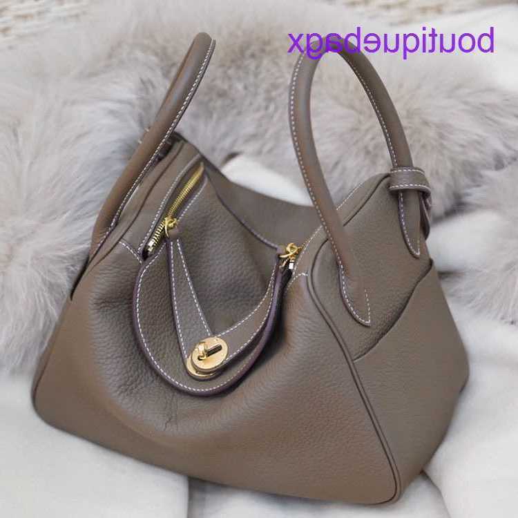 Designer Lindi Bags H Home on sale Bag2023 classic TC top leather bag Doctor Bag Leather Women's one shoulder portable medicineHave Real Logo, Milk silver buckle
Designer Lindi Bags H Home on sale Bag2023 classic TC top leather bag Doctor Bag Leather Women's one shoulder portable medicineHave Real Logo, Milk silver buckle