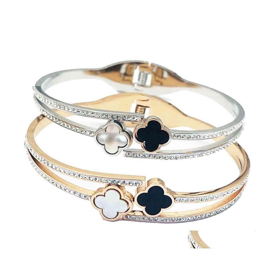Bangle Classic Titanium Steel Fourleaf Clover Black And White Disc Bracelets Fashion Korean Jewelry Unusual Womans Clavicle Ch Dhhcd
Bangle Classic Titanium Steel Fourleaf Clover Black And White Disc Bracelets Fashion Korean Jewelry Unusual Womans Clavicle Ch Dhhcd
