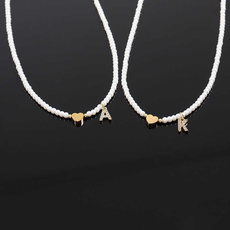 Beaded Necklaces New Fashion Initial Letter Heart Pendant Necklace Women Simple 3mm Imitation Pearl Bead for Jewelry Gift 230613
Beaded Necklaces New Fashion Initial Letter Heart Pendant Necklace Women Simple 3mm Imitation Pearl Bead for Jewelry Gift 230613
