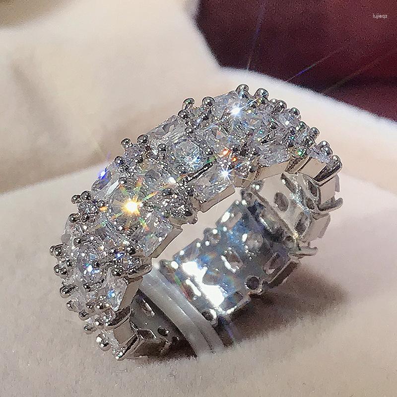 Wedding Rings YaYI Jewelry Top Quality Princess Cut White Cubic Zirconia Silver Color Engagement Party Unique Expensive Gifts
Wedding Rings YaYI Jewelry Top Quality Princess Cut White Cubic Zirconia Silver Color Engagement Party Unique Expensive Gifts