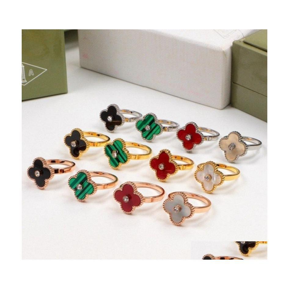 Band Rings Womens Designer Clover Fashion Fourleaf Flowers Diamond Ring Shell Titanium Steel Lovers Jewelry Drop Delivery Dhuzk
Band Rings Womens Designer Clover Fashion Fourleaf Flowers Diamond Ring Shell Titanium Steel Lovers Jewelry Drop Delivery Dhuzk