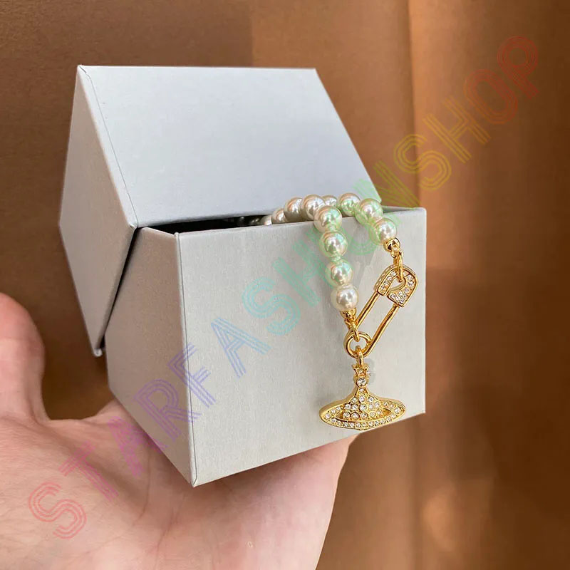 2023 Saturn Curved pin necklacePearl Beaded Diamond Tennis Necklace Woman Silver Chains Vintage Trendy Style Desigenr With Box
2023 Saturn Curved pin necklacePearl Beaded Diamond Tennis Necklace Woman Silver Chains Vintage Trendy Style Desigenr With Box