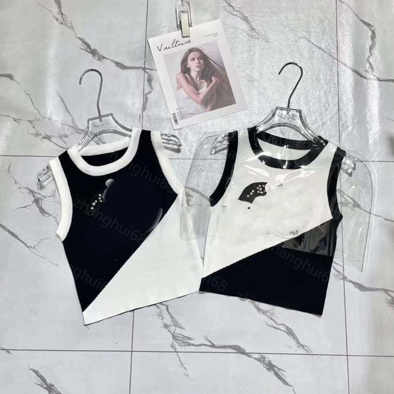 23ss womens designer clothing Womens Knits Camellia Pearl Sticky diamond color double C knitted vest tops High quality womens clothes a1
23ss womens designer clothing Womens Knits Camellia Pearl Sticky diamond color double C knitted vest tops High quality womens clothes a1