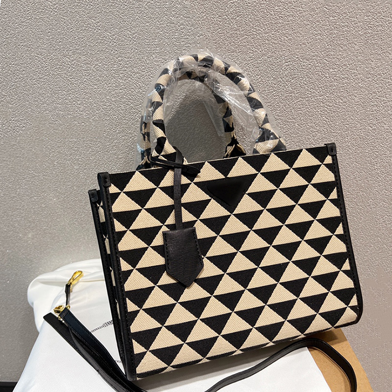 Top-quality Small 28cm 17cm Jacquard Fabric Bags Micro Tote Bag Black Beige Embroidered Handles Womens Handbag With Shoulder Strap, 28cm x 22cm
Top-quality Small 28cm 17cm Jacquard Fabric Bags Micro Tote Bag Black Beige Embroidered Handles Womens Handbag With Shoulder Strap, 28cm x 22cm