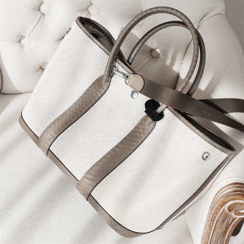 Totes 7a H ermess Garden Party Handbag Genuine Leather Fa Bin Gao Ding Canvas Combination Snake Skin BagOne Shoulder Oblique Straddle Handheld Concealed Buckl, Black4
Totes 7a H ermess Garden Party Handbag Genuine Leather Fa Bin Gao Ding Canvas Combination Snake Skin BagOne Shoulder Oblique Straddle Handheld Concealed Buckl, Black4
