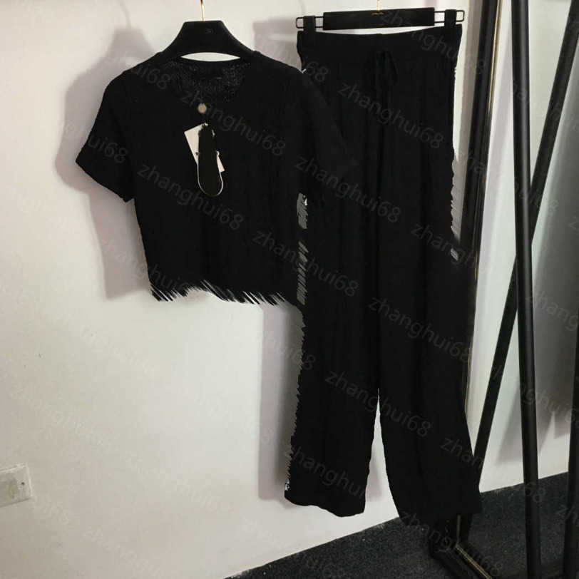 23ss women pants sets Casual suit womens designer clothing Monogram print slim short-sleeved sweater high-waisted wide-leg pants set Women Clothes a1
23ss women pants sets Casual suit womens designer clothing Monogram print slim short-sleeved sweater high-waisted wide-leg pants set Women Clothes a1
