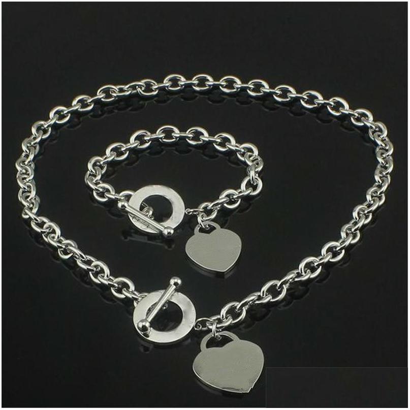 Bracelet Necklace Necklaceaddbracelet Love 925 Sier Set Wedding Statement Jewelry Heart Pendant Necklaces Bangle Sets 2 In 1 5841 Dhzw5, Silver tiff
Bracelet Necklace Necklaceaddbracelet Love 925 Sier Set Wedding Statement Jewelry Heart Pendant Necklaces Bangle Sets 2 In 1 5841 Dhzw5, Silver tiff