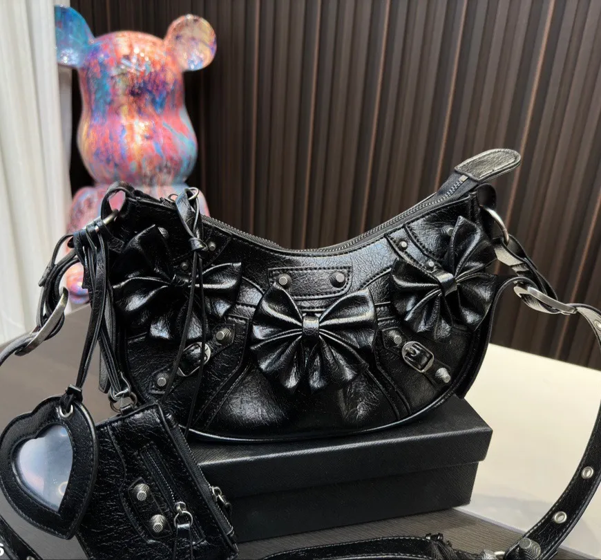 2023 New Locomotive Bag Luxury Designer Women's Bowtie Fashion Versatile One Shoulder Crossbody Bag Mirror, Black
2023 New Locomotive Bag Luxury Designer Women's Bowtie Fashion Versatile One Shoulder Crossbody Bag Mirror, Black