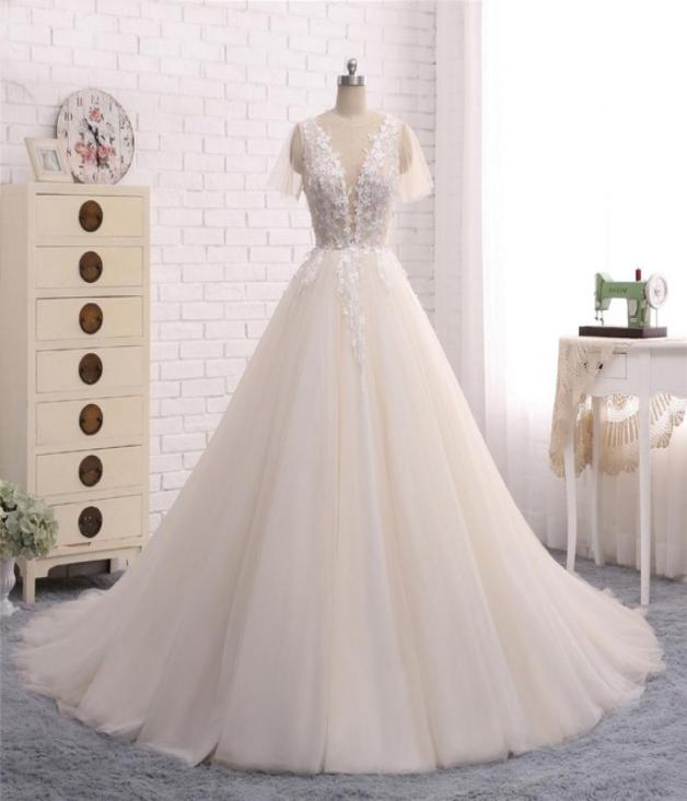 New Long Wedding Dress Scoop Short Sleeves ALine Chapel Train Appliques Tulle Bridal Gowns Vestido de noiva9476608, Same as image
New Long Wedding Dress Scoop Short Sleeves ALine Chapel Train Appliques Tulle Bridal Gowns Vestido de noiva9476608, Same as image