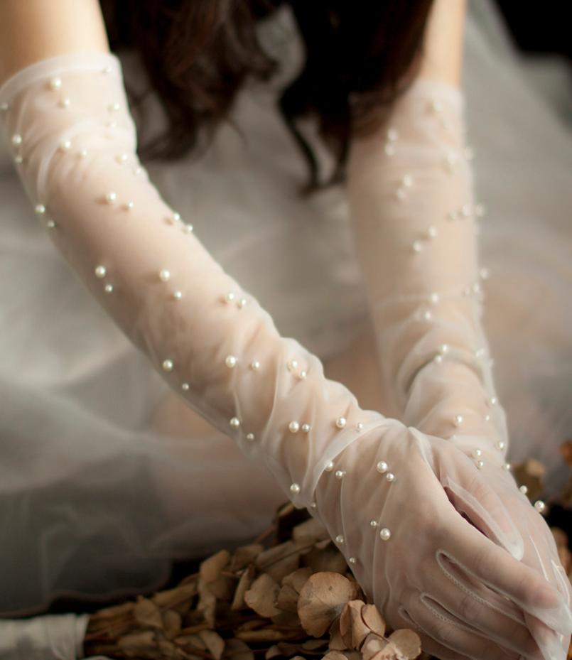Bride Wedding pearl Gloves long Design Lace Gauze Transparent Women Gloves Short bridal mesh gloves Wedding Accessories1107323, Ivory
Bride Wedding pearl Gloves long Design Lace Gauze Transparent Women Gloves Short bridal mesh gloves Wedding Accessories1107323, Ivory
