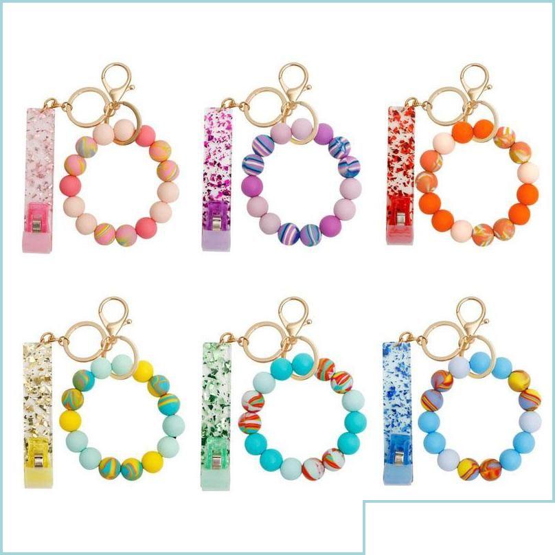 Keychains Lanyards Handmade Stretched Sile Beads Bangle Bank Card Fetcher Wristlet Bracelet Keyrings 6 Styles Drop Deliv Delivery Dhorf
Keychains Lanyards Handmade Stretched Sile Beads Bangle Bank Card Fetcher Wristlet Bracelet Keyrings 6 Styles Drop Deliv Delivery Dhorf
