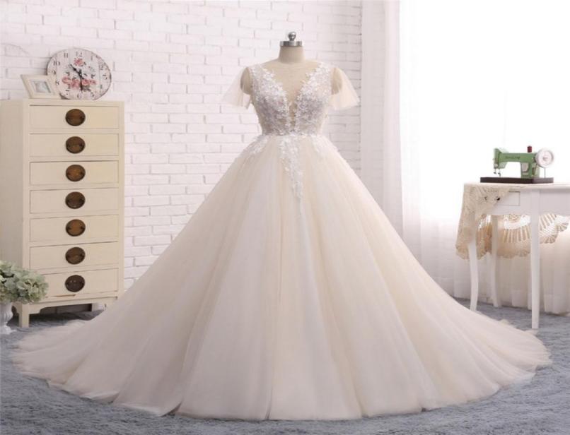 New Long Wedding Dress Scoop Short Sleeves ALine Chapel Train Appliques Tulle Bridal Gowns Vestido de noiva6560653, Ivory
New Long Wedding Dress Scoop Short Sleeves ALine Chapel Train Appliques Tulle Bridal Gowns Vestido de noiva6560653, Ivory
