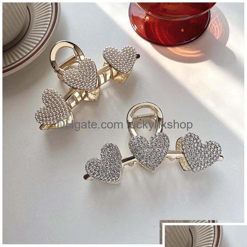 Clamps Love Clamp Pearl Diamond Claw Clip Women Korean Butterfly Hair Clips Plated Gold Cute Jewelry Ornaments 5948 Q2 Drop Delivery Dhjsm
Clamps Love Clamp Pearl Diamond Claw Clip Women Korean Butterfly Hair Clips Plated Gold Cute Jewelry Ornaments 5948 Q2 Drop Delivery Dhjsm