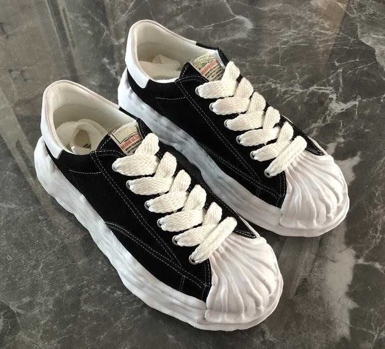 Maison Mihara Yasuhiro MMY Dissolved Shoes Women's Flat Sole Board Shoes Sports Shell Head Thick Sole Canvas Small White Shoes, Color 6
Maison Mihara Yasuhiro MMY Dissolved Shoes Women's Flat Sole Board Shoes Sports Shell Head Thick Sole Canvas Small White Shoes, Color 6