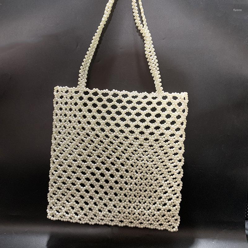 Evening Bags Fashion Pearl White Silver Beaded Shoulder Bag Women's Simple Casual Hollow Out Design Handbag Large Capacity Versatile
Evening Bags Fashion Pearl White Silver Beaded Shoulder Bag Women's Simple Casual Hollow Out Design Handbag Large Capacity Versatile