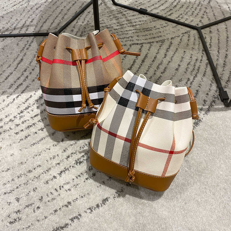 Bag women's bag simple checkered bucket bag new women's fashion Mini One Shoulder Messenger Bag, Retro coffee
Bag women's bag simple checkered bucket bag new women's fashion Mini One Shoulder Messenger Bag, Retro coffee