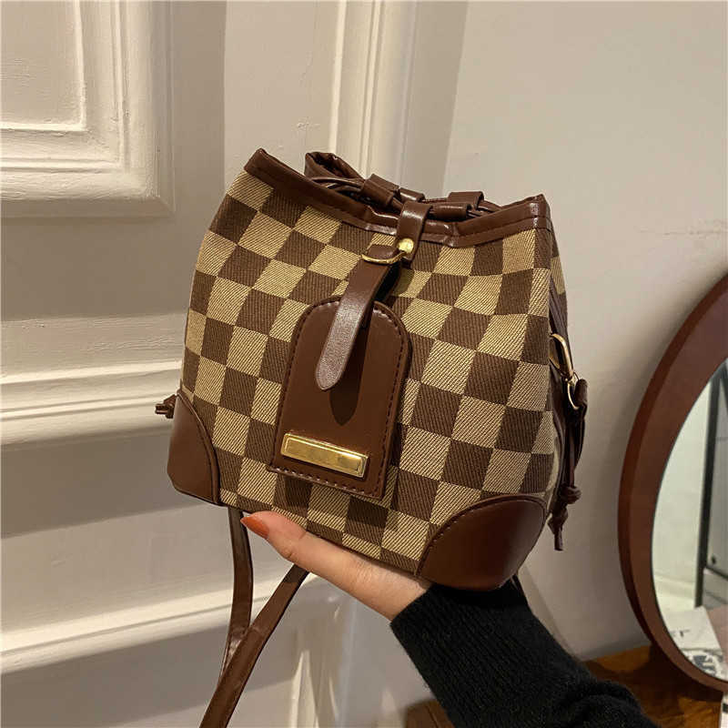 Leisure design simple bag new checkerboard bucket bag ins net red popular messenger bag women's bag, Black6
Leisure design simple bag new checkerboard bucket bag ins net red popular messenger bag women's bag, Black6