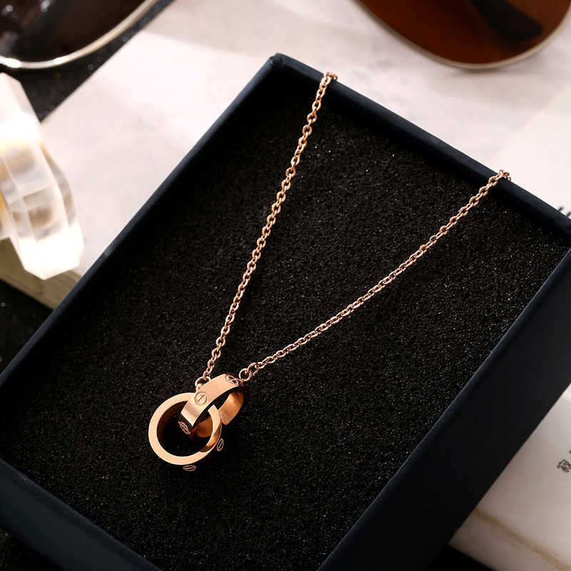 Original designer Double ring necklace for women with matching titanium steel non fading collarbone chain Japanese and Korean temperament short student jewelry
Original designer Double ring necklace for women with matching titanium steel non fading collarbone chain Japanese and Korean temperament short student jewelry