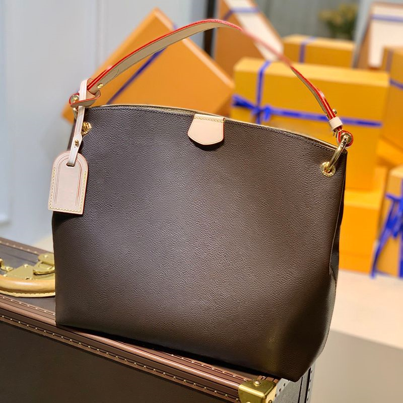 Crossbody knockoff Designer Box With bag Genuine Luxury Shoulder Bag Delicate Shopping 35CM Bag leather Handbag YL216, M43700
Crossbody knockoff Designer Box With bag Genuine Luxury Shoulder Bag Delicate Shopping 35CM Bag leather Handbag YL216, M43700