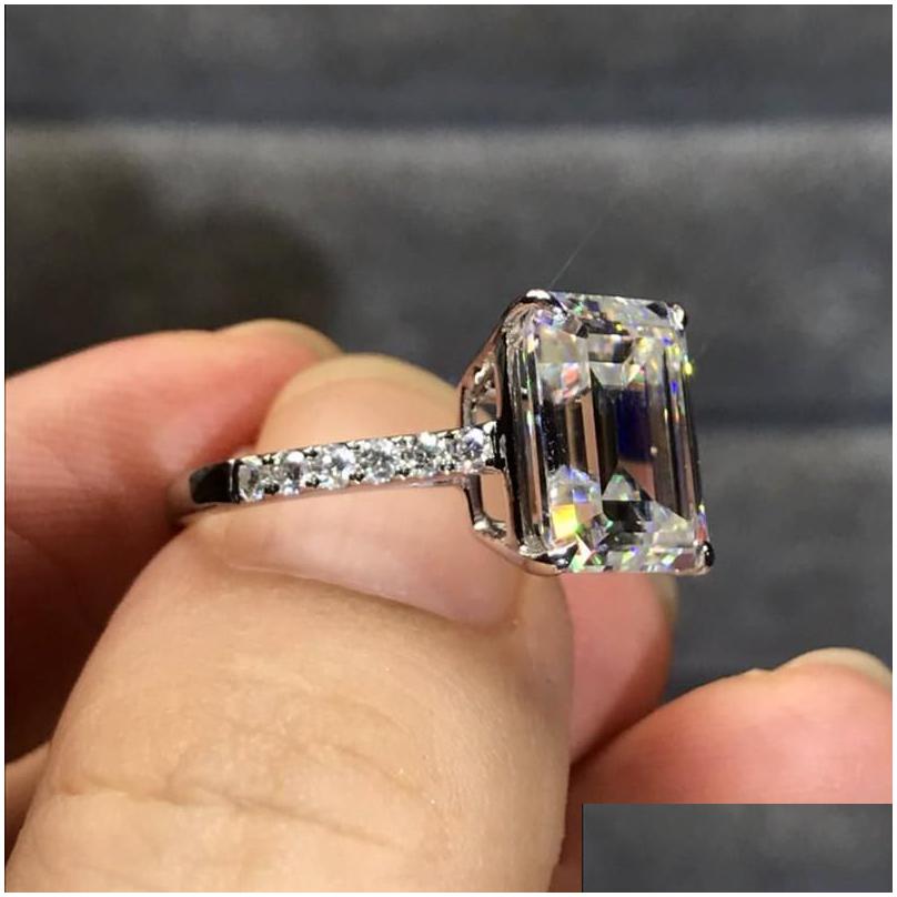 Cluster Rings Luxury 100% 925 Sterling Sier Created Emerald Cut 4Ct Diamond Engagement Cocktail Women Fine Jewelry Drop Delivery Ring Dhzh2