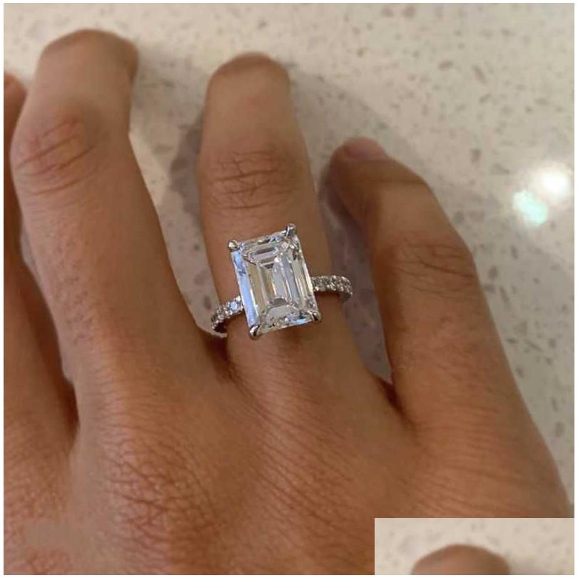 Cluster Rings Luxury 100% 925 Sterling Sier Created Emerald Cut 4Ct Diamond Engagement Cocktail Women Fine Jewelry Drop Delivery Ring Dhzh2