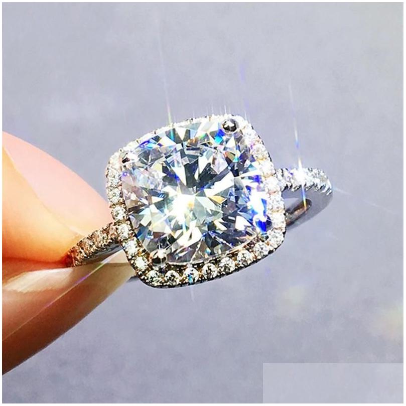 Cluster Rings Luxury 100% 925 Sterling Sier Created Emerald Cut 4Ct Diamond Engagement Cocktail Women Fine Jewelry Drop Delivery Ring Dhzh2