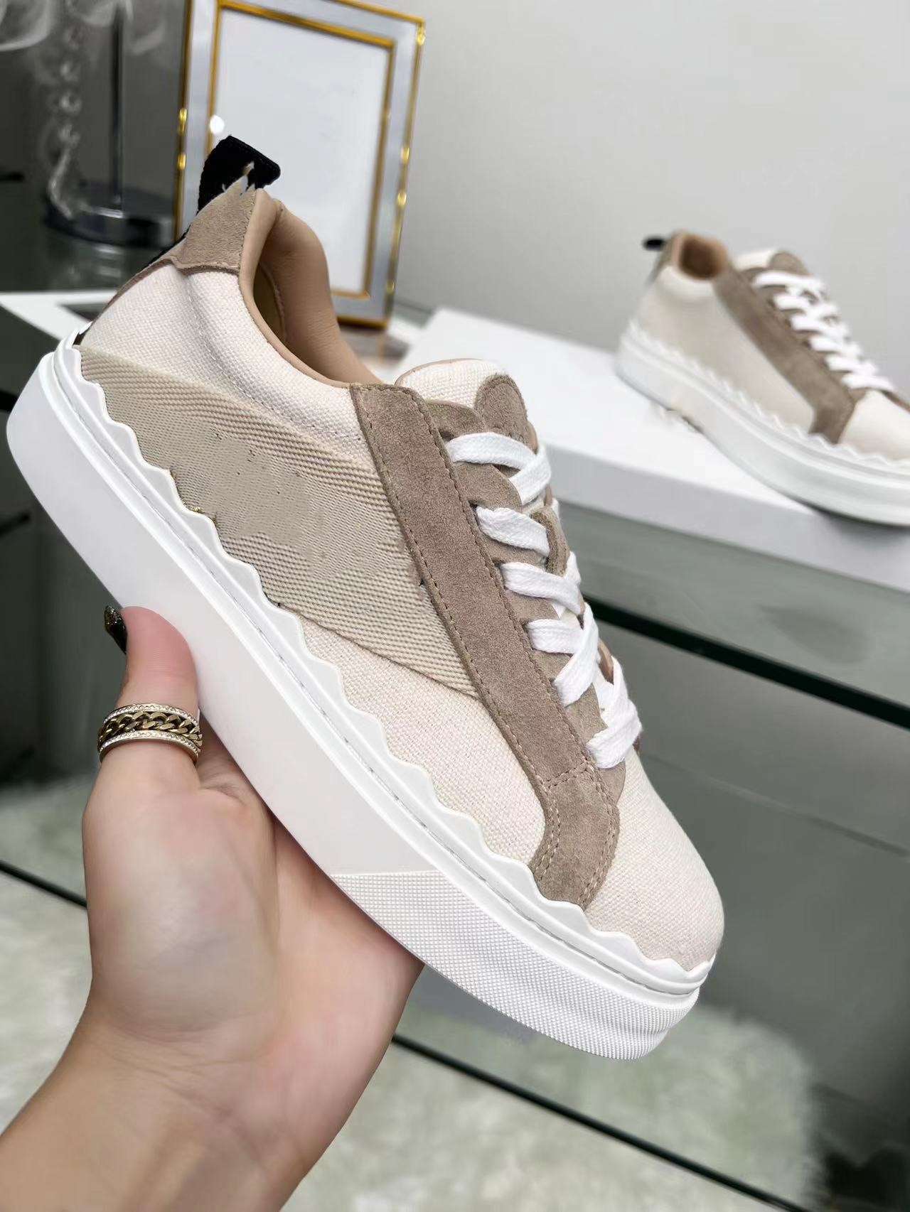 LAUREN canvas sneakers sandals lace-up Inspired by the soft pairing of leather and textured canvas in Woody collection