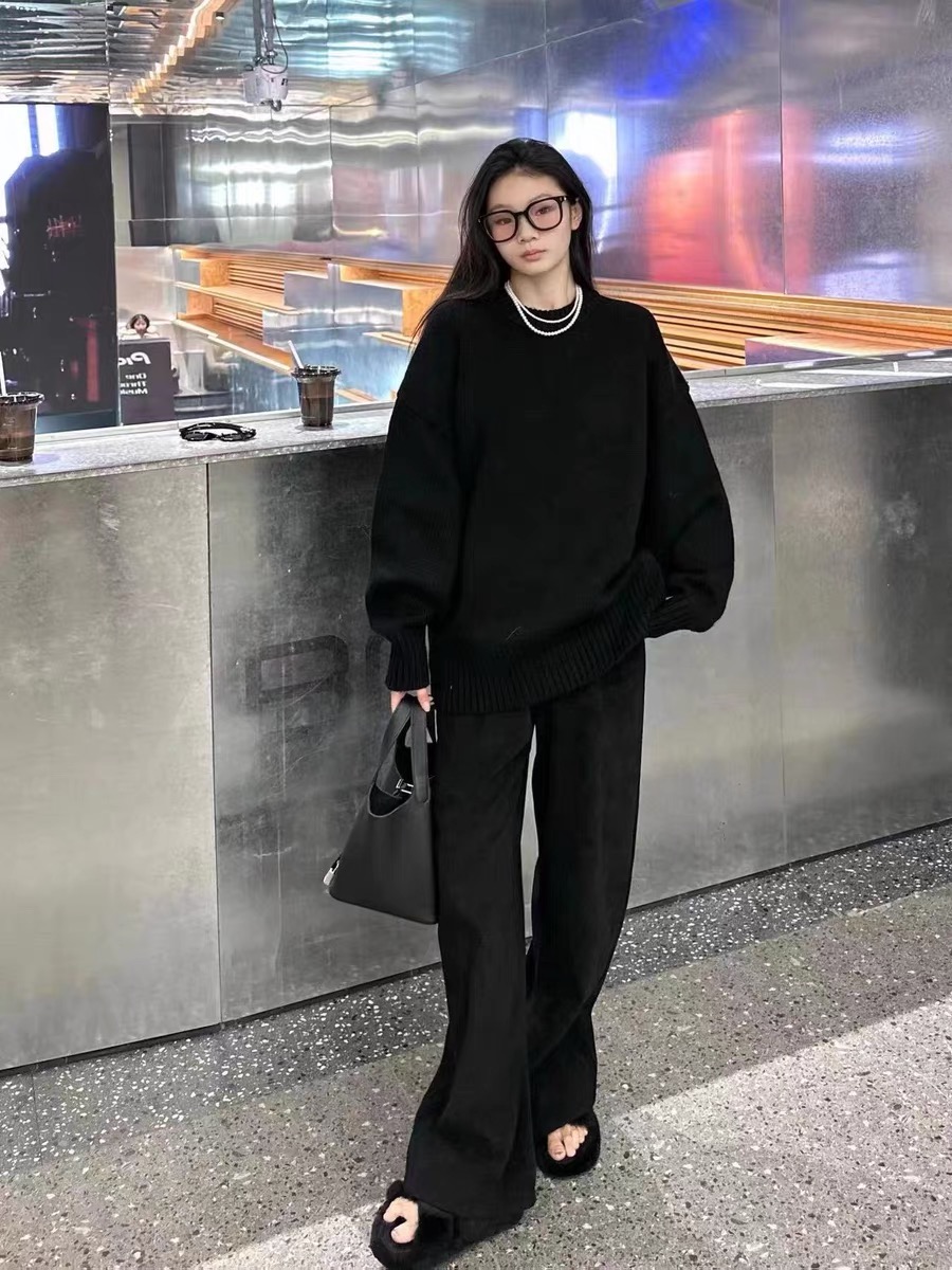 The *Row Women's Crewneck Cashmere Sweater with Long Sleeves Thick Knit