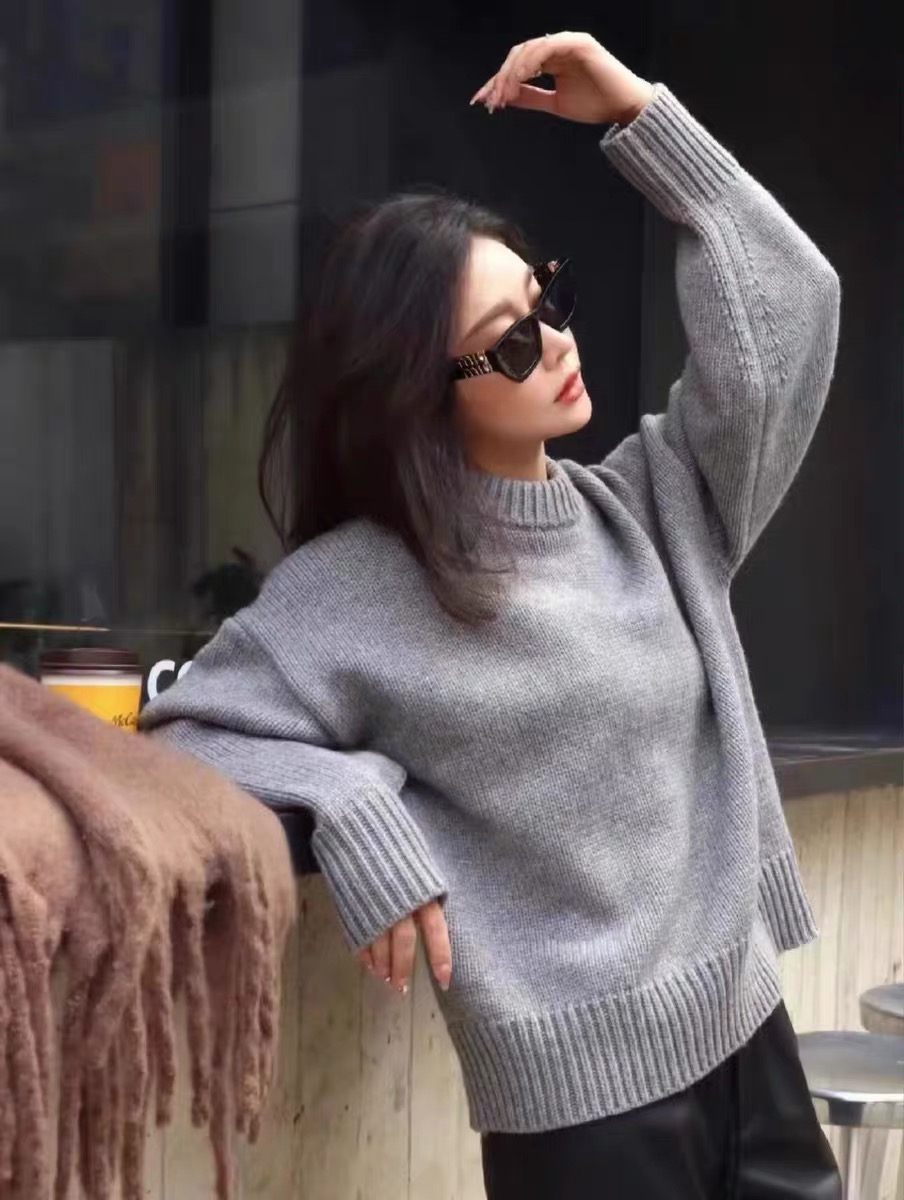 The *Row Women's Crewneck Cashmere Sweater with Long Sleeves Thick Knit