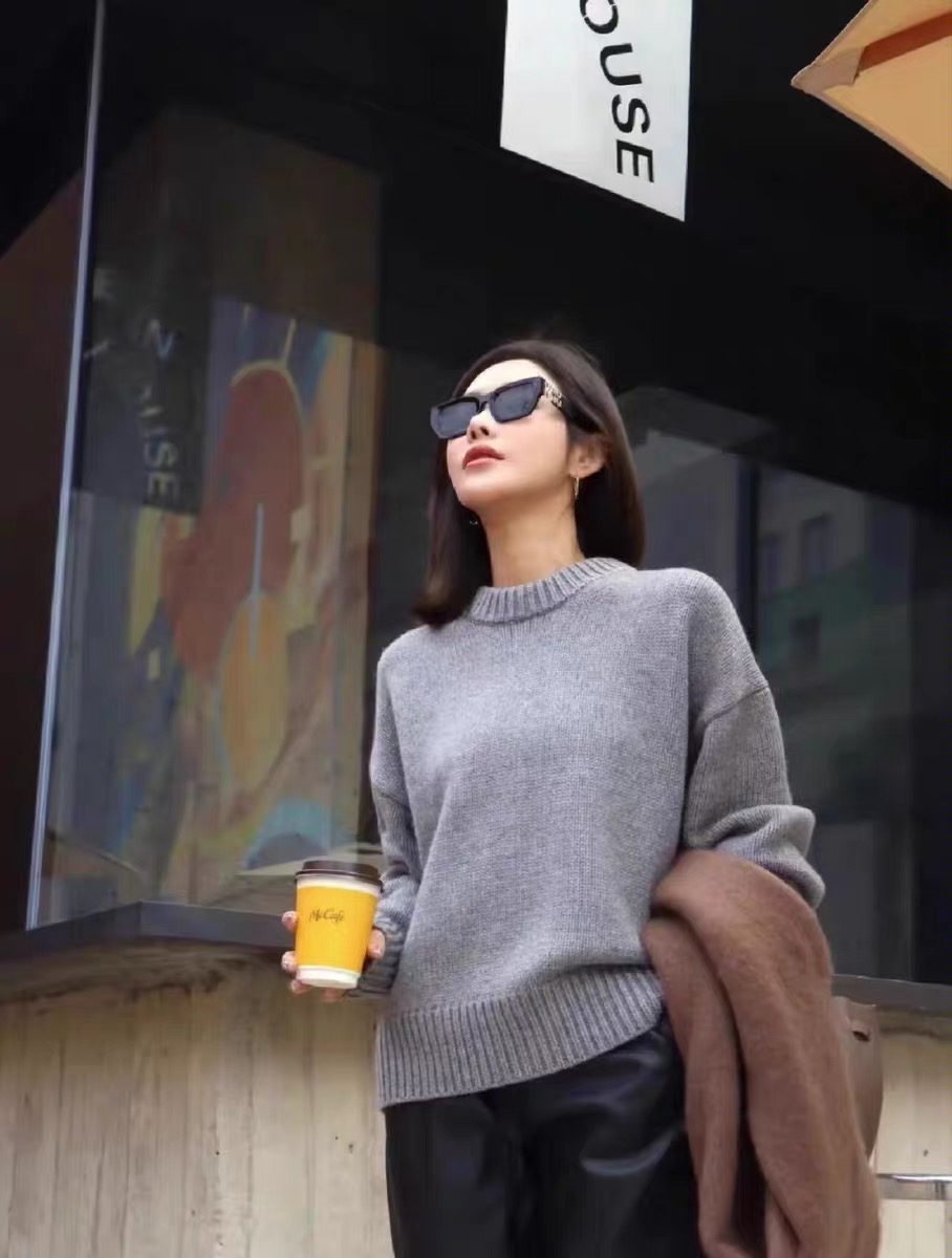 The *Row Women's Crewneck Cashmere Sweater with Long Sleeves Thick Knit