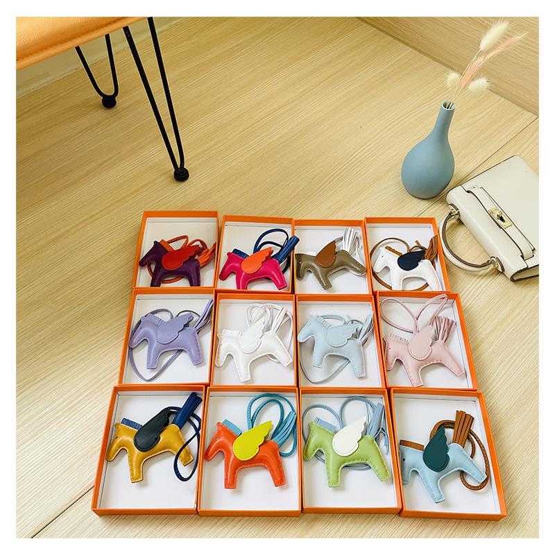 Cartoon Angel Pony Bag Pendant Leather Key Buckle Lanyards Mobile phone Jewelry Fashion Car Backpack Key Ring Designer Luxury Keychains orange horse High Quality