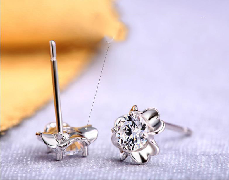 Women's Sterling Silver Round CZ Stud Earrings - Luck-Inspired Design for Festivals