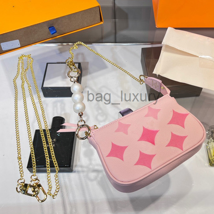 Designer bag Luxurys Women Mini Bags Handbag Wallet Imprint fiower 2 Golden Chains With Pearl Bag Genuine Leather Messenger Ladies Wallets Purse 15x10cm, Pink
Designer bag Luxurys Women Mini Bags Handbag Wallet Imprint fiower 2 Golden Chains With Pearl Bag Genuine Leather Messenger Ladies Wallets Purse 15x10cm, Pink
