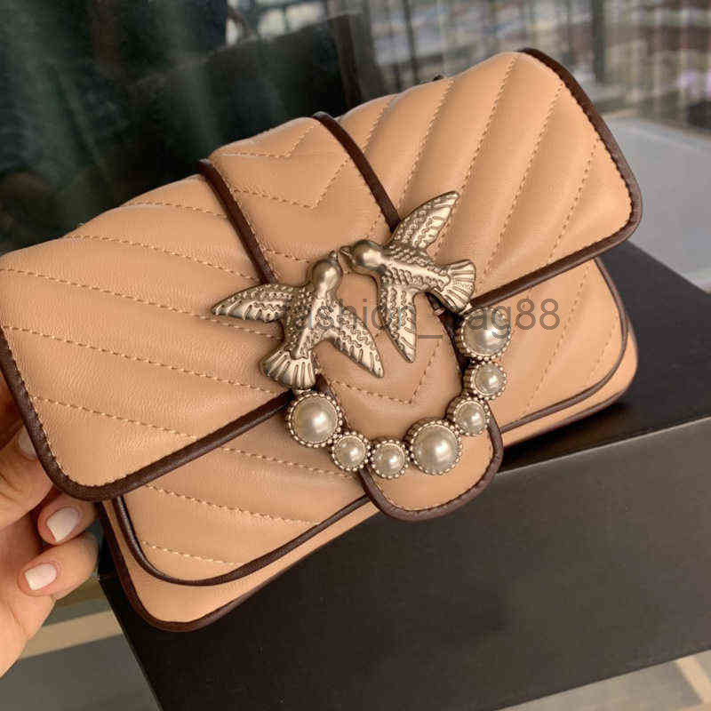 Totes designer pinkoos bags Swallow pearl buckle parchment color matching one shoulder chain diagonal postman's female Dongguan yzl 2022
Totes designer pinkoos bags Swallow pearl buckle parchment color matching one shoulder chain diagonal postman's female Dongguan yzl 2022