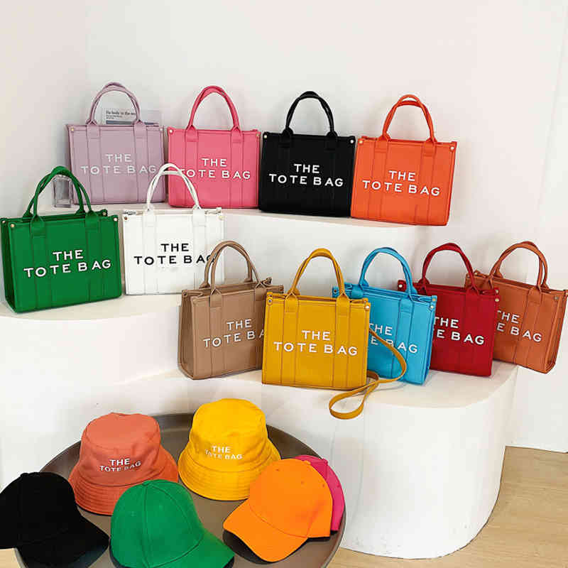 Marc Tote Bag Evening Designer Bags Designer Lychee Pattern Handbag Women Portable Shopping High Sense Fashion One Shoulder Messenger 220511, Red
Marc Tote Bag Evening Designer Bags Designer Lychee Pattern Handbag Women Portable Shopping High Sense Fashion One Shoulder Messenger 220511, Red