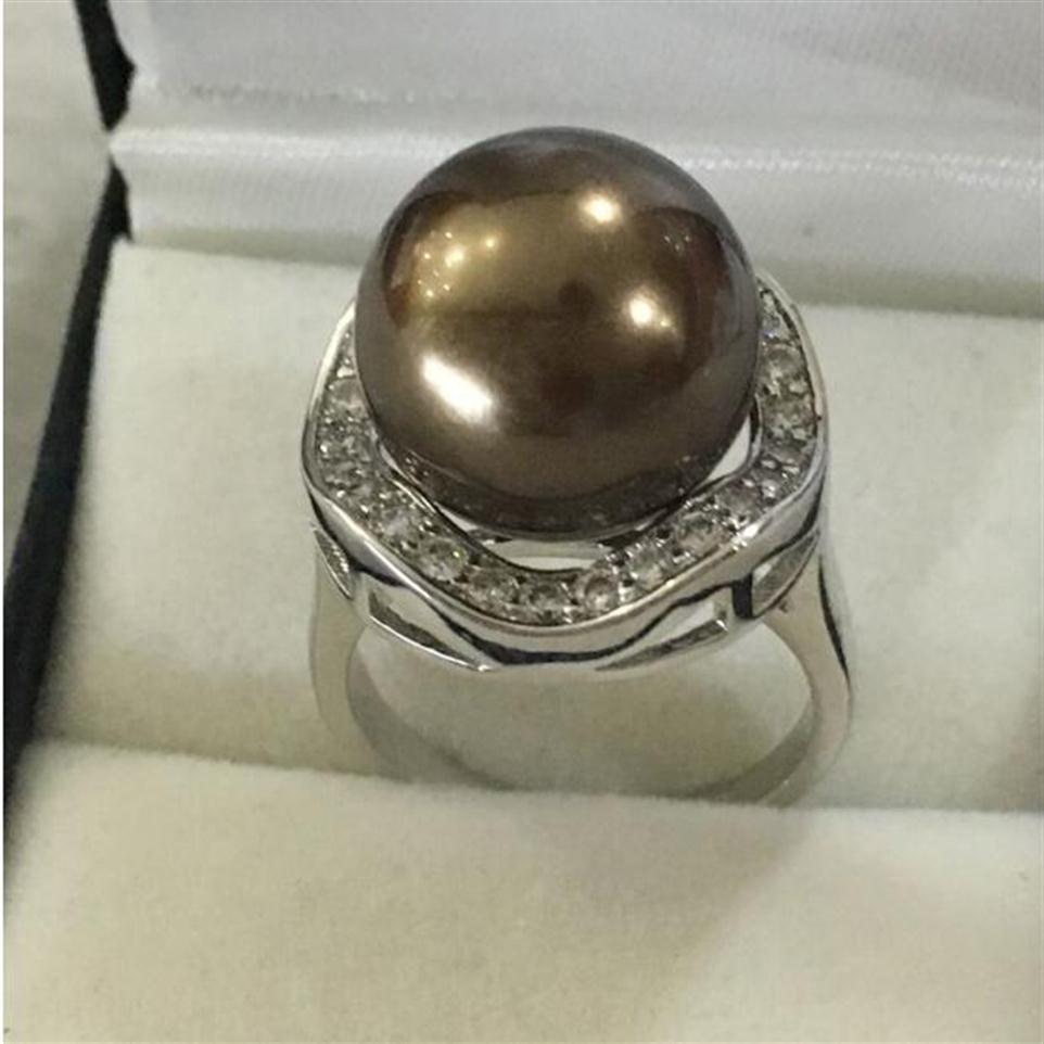 Jewelryr Pearl Ring New lady's delicate silver plated inlay crystal 14mm brown shell pearl ring SIZE 7 8 9 10 1692
Jewelryr Pearl Ring New lady's delicate silver plated inlay crystal 14mm brown shell pearl ring SIZE 7 8 9 10 1692