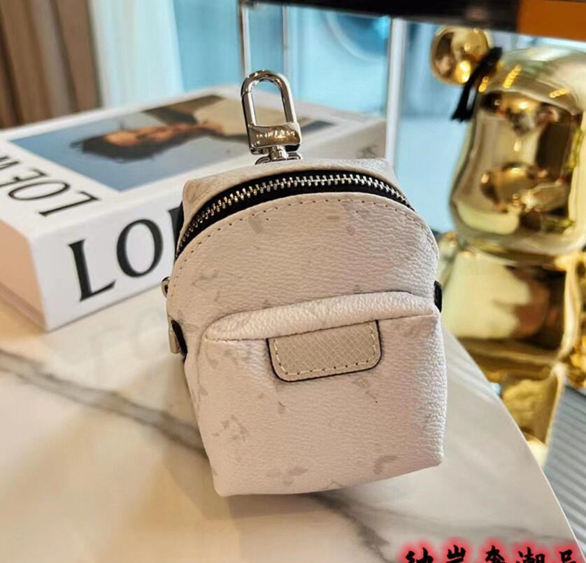 Classic Designer Unisex Key Wallet Luxury Brand Mini Backpack Multifunctional Keychain Outdoor Sports Women and Men Coin Purses Fashion Ladies Totes Clutch, White
Classic Designer Unisex Key Wallet Luxury Brand Mini Backpack Multifunctional Keychain Outdoor Sports Women and Men Coin Purses Fashion Ladies Totes Clutch, White