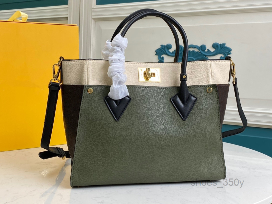 Evening Bags On My Side Tote Bucket Bag Made From Soft Calf Leather With Sides Panels In Classic CanvasMulti Pochette
Evening Bags On My Side Tote Bucket Bag Made From Soft Calf Leather With Sides Panels In Classic CanvasMulti Pochette