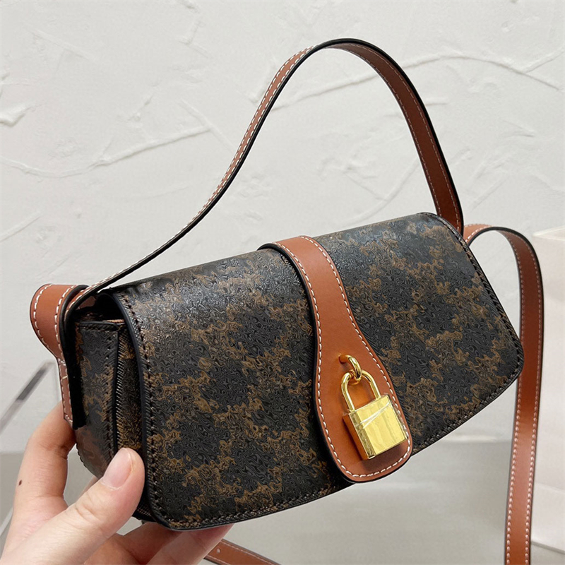 Clutch bag on strap TABOU in triomphe canvas and calfskin flap with decorative lock snap button closure designer bags smooth leather underarm shoulder bag, I need see other product
Clutch bag on strap TABOU in triomphe canvas and calfskin flap with decorative lock snap button closure designer bags smooth leather underarm shoulder bag, I need see other product