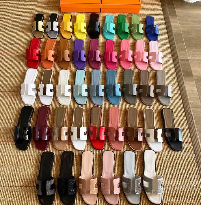Designer Women Slippers H Brand Sandals Real Leather Solid Beach Slides Lychee Skin Metallic Silver Lime Royal Dark Grey Khaki Maroon Fonce 35-42 No Box, Black shiny
Designer Women Slippers H Brand Sandals Real Leather Solid Beach Slides Lychee Skin Metallic Silver Lime Royal Dark Grey Khaki Maroon Fonce 35-42 No Box, Black shiny