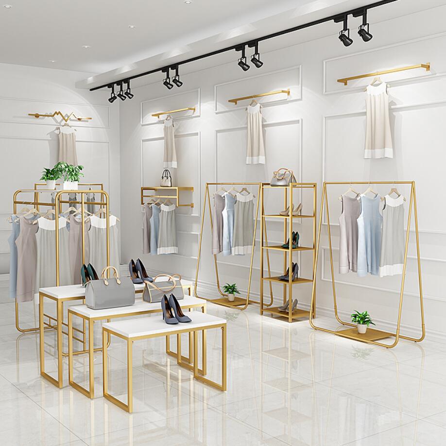Gold clothing store display rack Bedroom Furniture floor type women's cloth store hanger on the wall clothes racks and middle island show shelf
Gold clothing store display rack Bedroom Furniture floor type women's cloth store hanger on the wall clothes racks and middle island show shelf