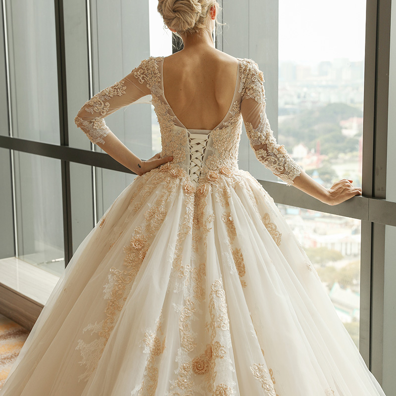 Arabic Gorgeous Ball Gown Wedding Dresses Champagne Lace Appliques Scoop Neck 3/4 Long Sleeves Sweep Train Puffy Tulle Open Back Bridal Gowns