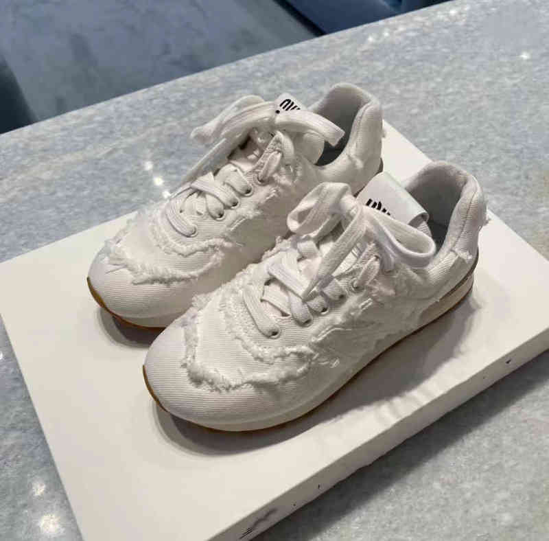 Miu family co branded Khaki sneakers women 2022 summer new letter N raw canvas versatile small white shoes women, Blue
Miu family co branded Khaki sneakers women 2022 summer new letter N raw canvas versatile small white shoes women, Blue