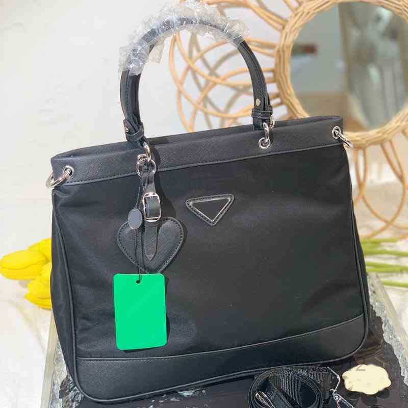 Briefcases Luxury Designertote Bags Women Shopping Handbag Shoulder High Quality Nylon Crossbody Female Travel Purses 220402Multi Pochette
Briefcases Luxury Designertote Bags Women Shopping Handbag Shoulder High Quality Nylon Crossbody Female Travel Purses 220402Multi Pochette