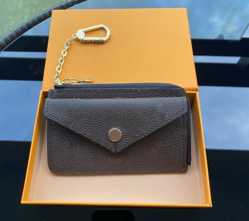 2022 Designer Fashion Womens Mini Zippy Organizer Wallets Coin Purse Bag Belt Charm Key Pouch Pochette Accessoires With box, Black embossing
2022 Designer Fashion Womens Mini Zippy Organizer Wallets Coin Purse Bag Belt Charm Key Pouch Pochette Accessoires With box, Black embossing