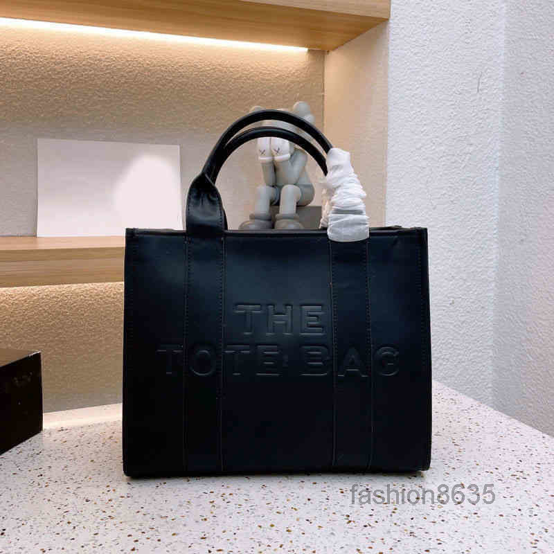 Evening Bags Marc The Tote Bag Designer Embossed Embossing Totes Bags Women leather All-match Shopper Shoulder Handbags High Quality 220809
Evening Bags Marc The Tote Bag Designer Embossed Embossing Totes Bags Women leather All-match Shopper Shoulder Handbags High Quality 220809