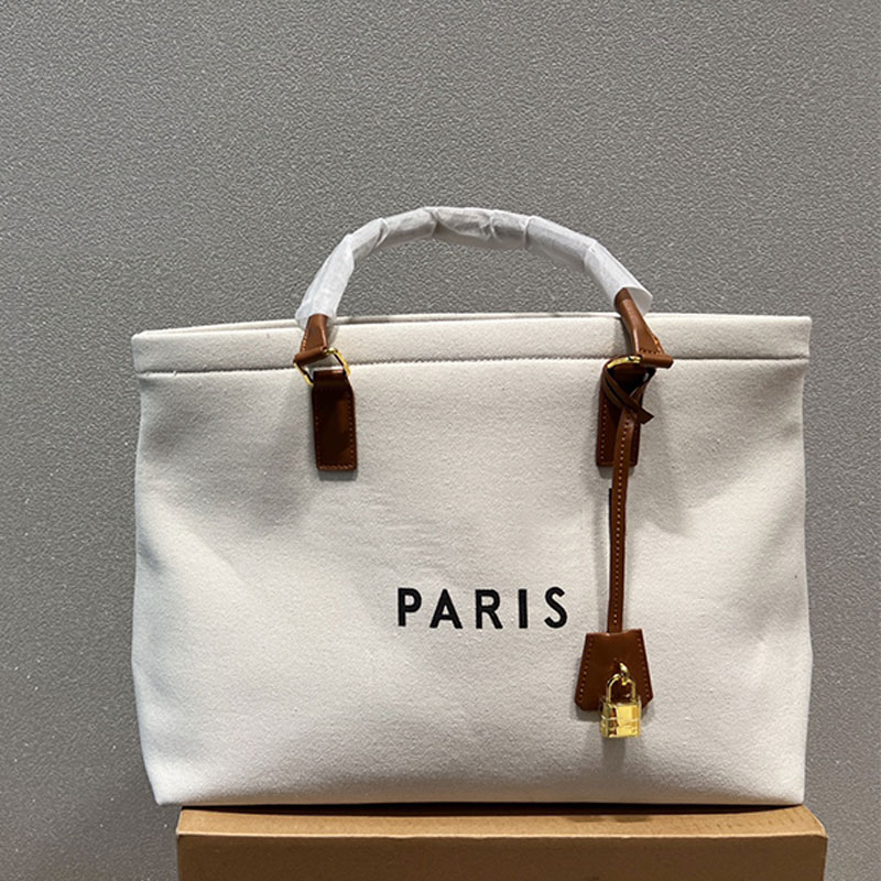 Canvas Handbag Large Tote Shopping Bags Leather Handle Key Gold Lock Interior Zip Pocket Letter Printing Women Casual Travel Pocket 40cm
Canvas Handbag Large Tote Shopping Bags Leather Handle Key Gold Lock Interior Zip Pocket Letter Printing Women Casual Travel Pocket 40cm