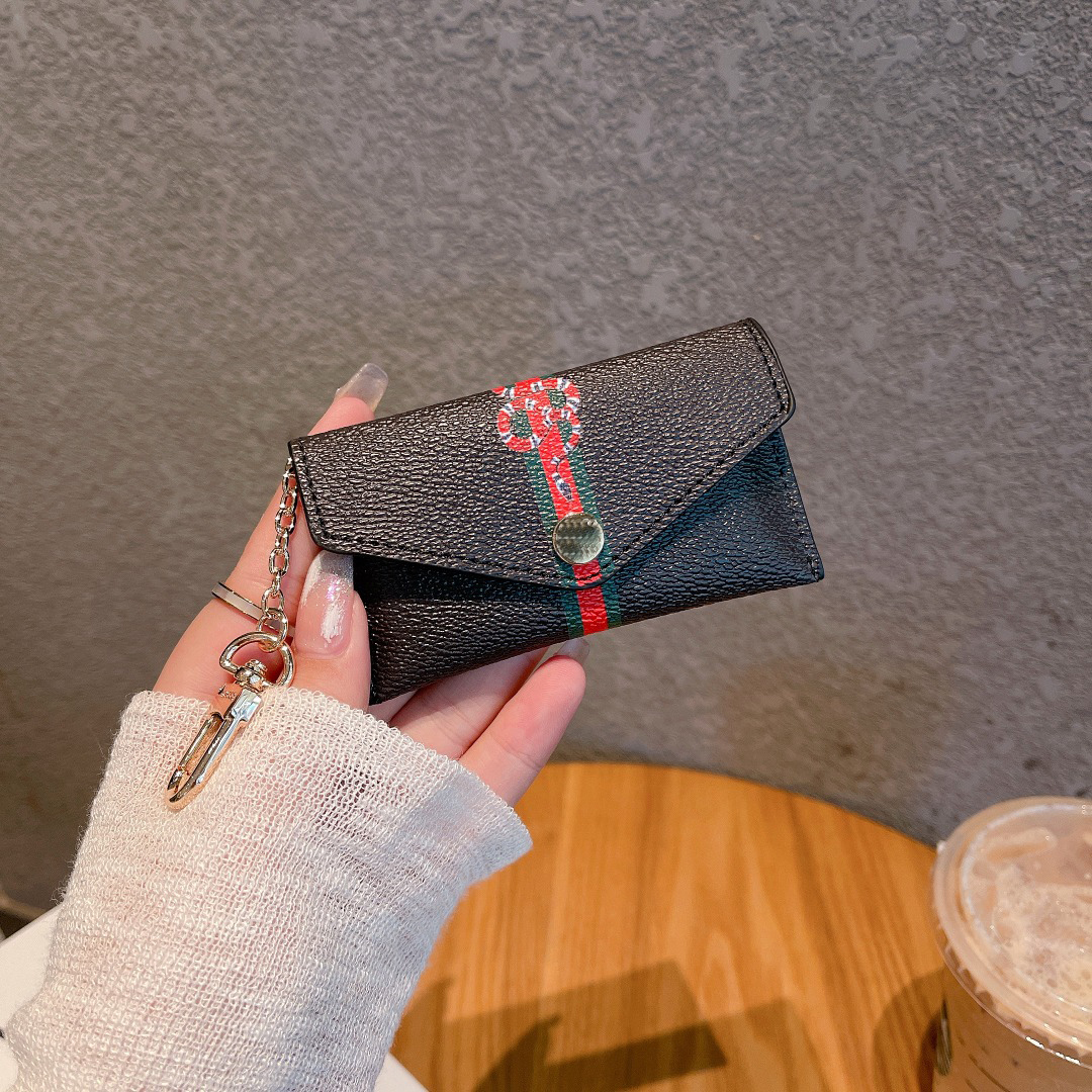 Designers Letter Wallet Keychain Keyring Fashion Men Women Purse Pendant Car Chain Charm Flower Mini Bag Gift Accessories Keychains
Designers Letter Wallet Keychain Keyring Fashion Men Women Purse Pendant Car Chain Charm Flower Mini Bag Gift Accessories Keychains