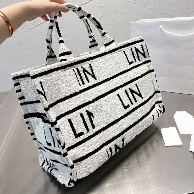 Designer Fabric Handbags Women Luxury Totes Shoulder Bags Towel Embroidery Womens Fashion Tote Designers Shopping Bag Letters Purse 2209152D, C(28*15cm)
Designer Fabric Handbags Women Luxury Totes Shoulder Bags Towel Embroidery Womens Fashion Tote Designers Shopping Bag Letters Purse 2209152D, C(28*15cm)