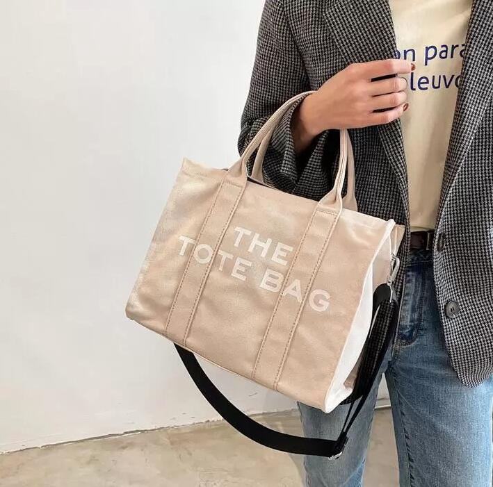 Marc Designer Bag Tote Women Casual Large Capacity Handbag Fashion Beach Canvas Crossbody Bags Luxury Brand Shoulder Bag Wallet 31cm
Marc Designer Bag Tote Women Casual Large Capacity Handbag Fashion Beach Canvas Crossbody Bags Luxury Brand Shoulder Bag Wallet 31cm